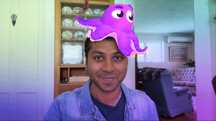 Jigarius with Google Meet's Augmented Reality Octupus sitting on his head